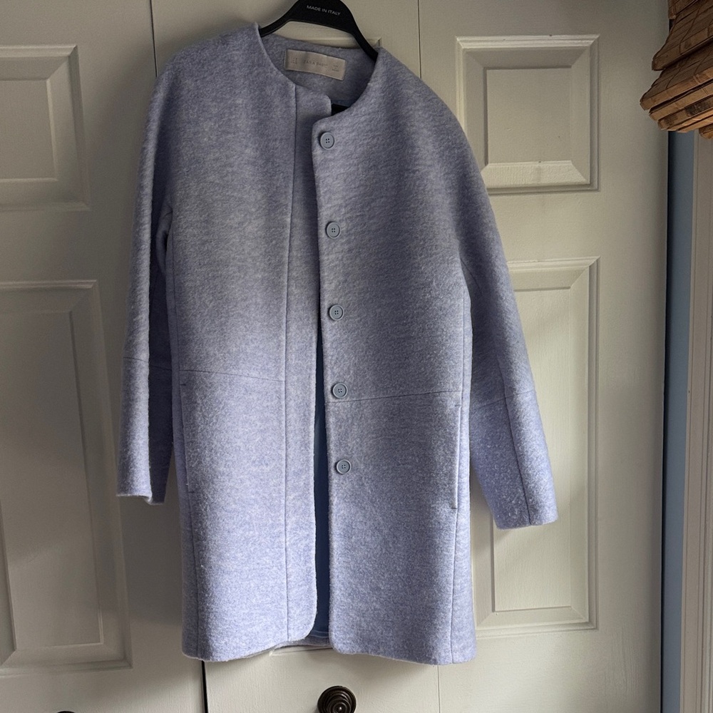 Thick light purple/blue Button-Up jacket.